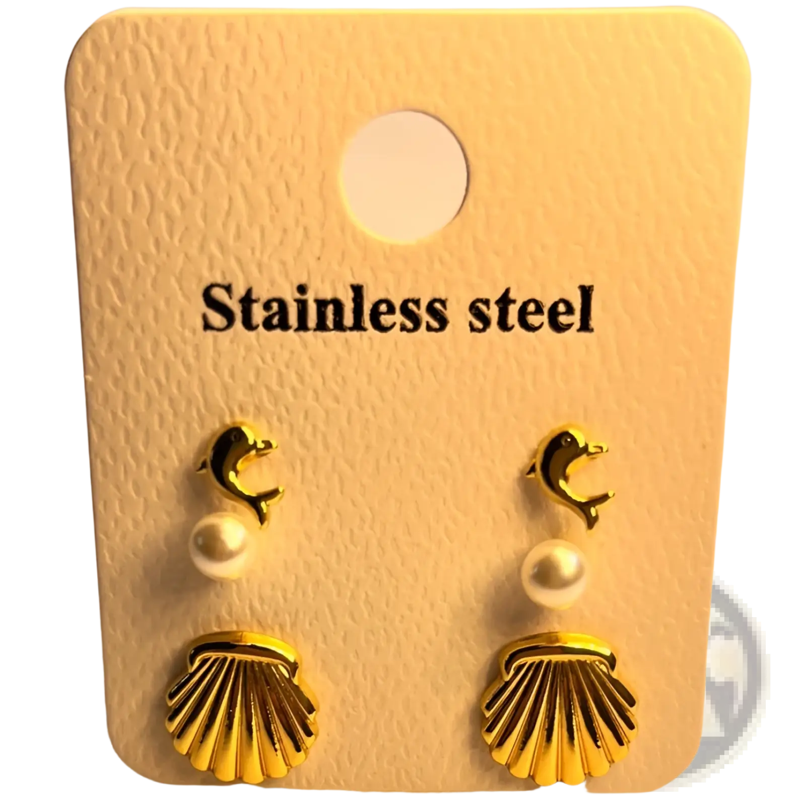 Premium gold plated dolphin and shell stud earrings with pearl accents displayed on a stainless steel card