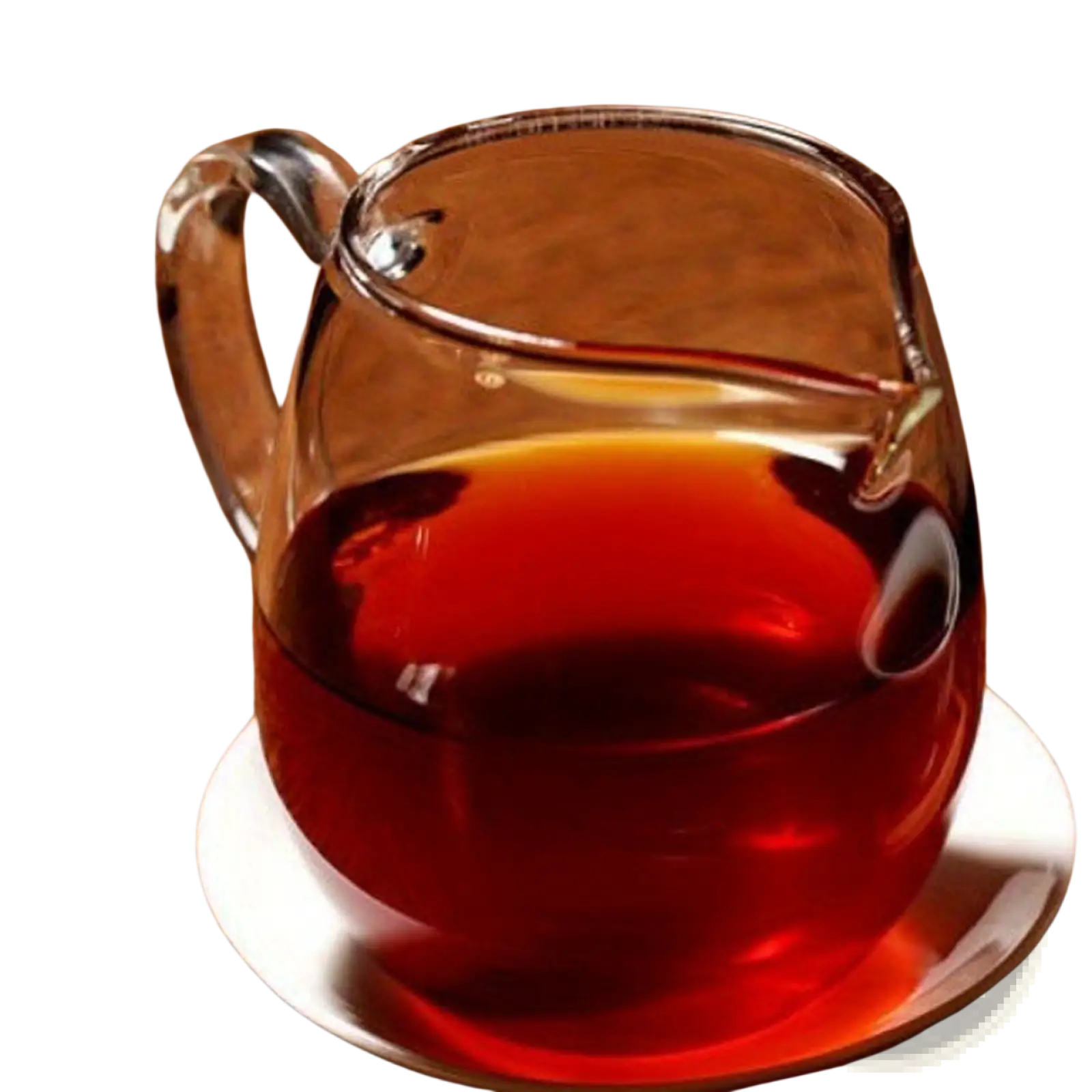 A clear glass pitcher filled with amber premium Yunnan ripe puer tea on a white saucer for health care use