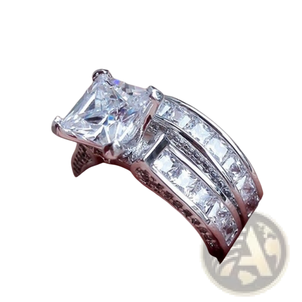 A sparkling silver princess cut cz engagement ring set with a large center stone and detailed matching bands