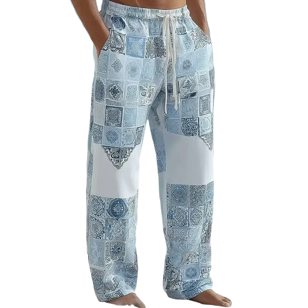 Light blue and white printed casual drawstring trousers with ornate tile patchwork design for comfortable wear