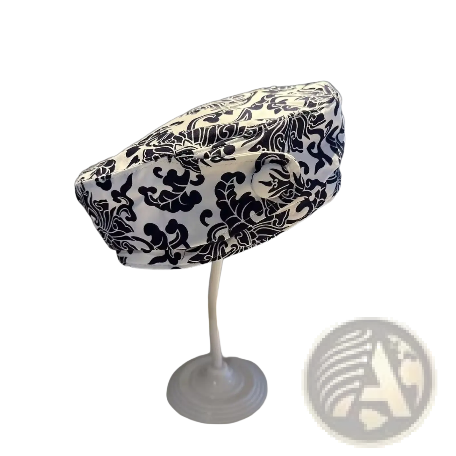 Black and white damask-patterned printed korean style fabric fashion cap displayed on a stand