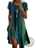 Printed summer midi dress featuring a flowing short-sleeved design with vibrant teal green and purple striped gradient