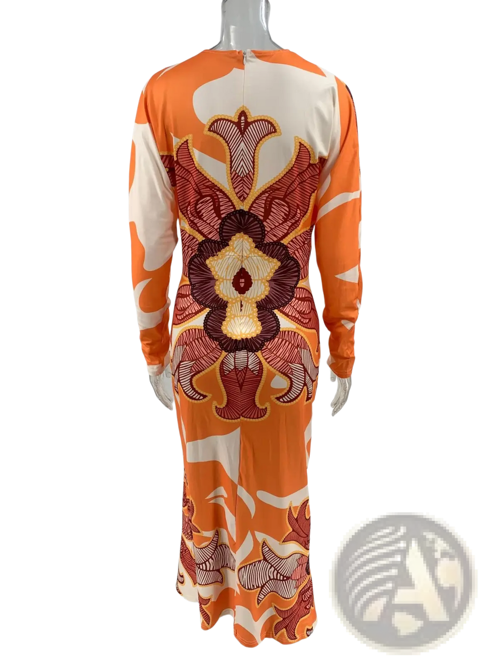 Printed v-neck geometric wrap midi dress featuring orange and cream long sleeves with bold symmetrical floral pattern