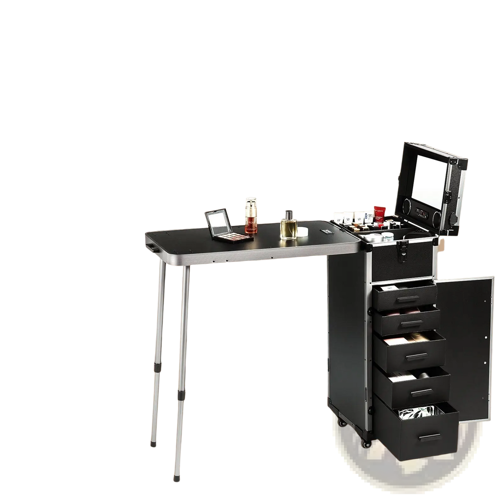 Professional makeup train case in black and silver with foldable table, multiple drawers, wheels, and Bluetooth speaker