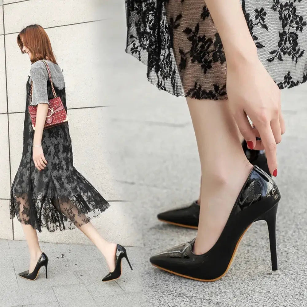 Black patent leather pointed toe stiletto pumps with a glossy finish and high heel design for formal wear
