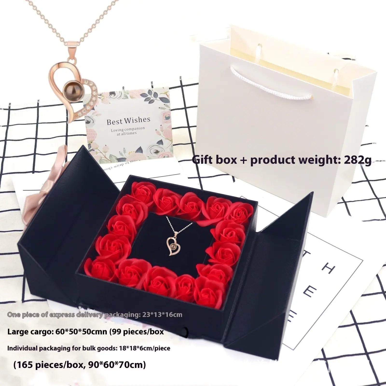 Elegant rose gold heart-shaped projection necklace in black gift box surrounded by red foam roses gift set