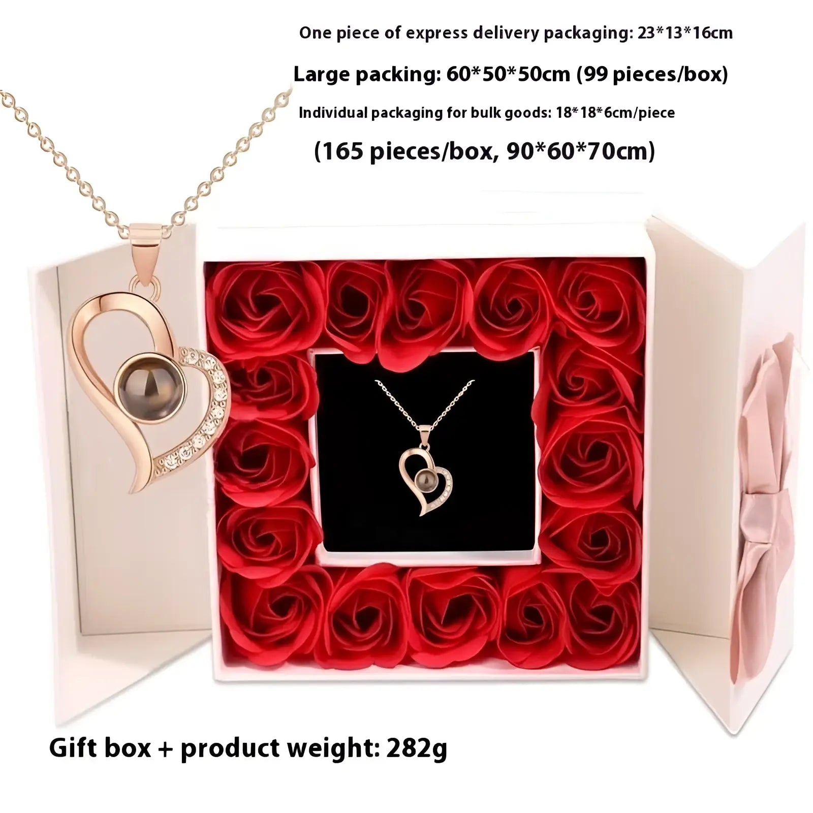 A projection heart necklace with a dark round pendant and sparkling crystals in a white gift box surrounded by roses