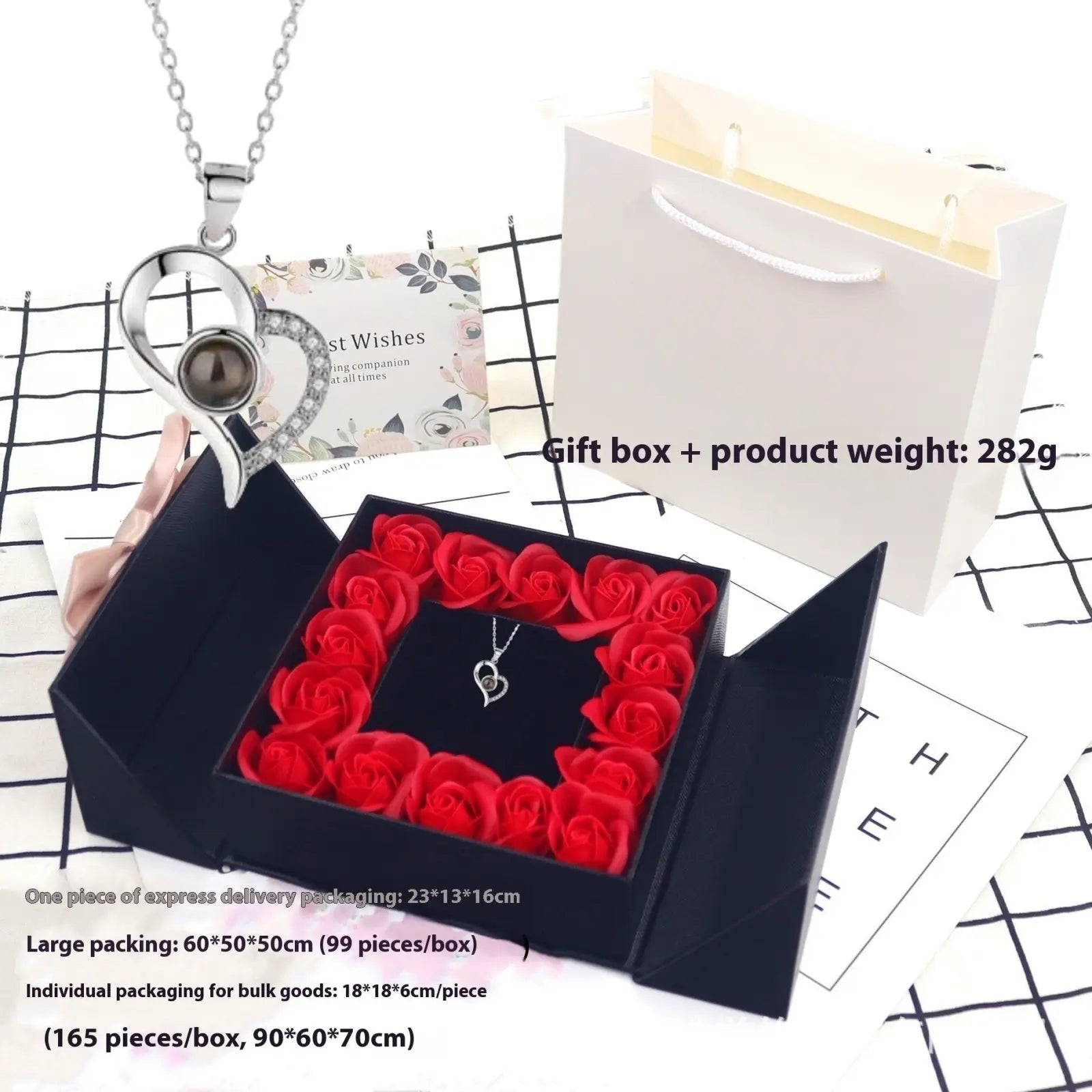 Silver heart-shaped pendant necklace with dark gemstone and diamond accents in projection heart necklace rose gift box set