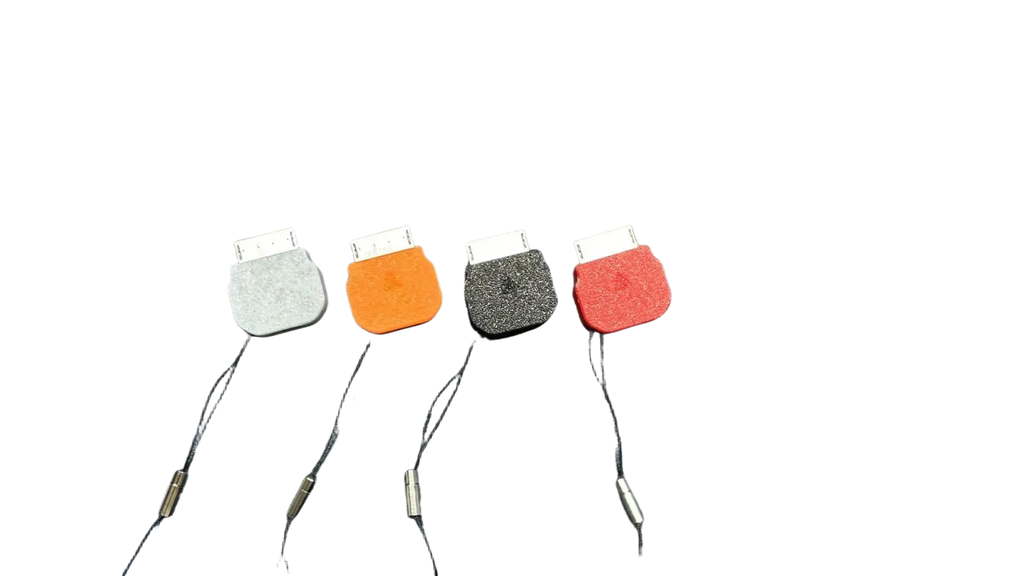 Psp Go Type C converter charging cable accessory with four felt-covered usb cable protectors in gray orange black and red