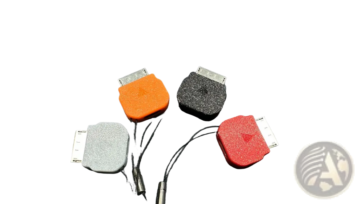 Three colorful textured protective caps in orange black and red for iphone 30-pin connectors with matching braided cords for psp go type c converter charging cable accessory