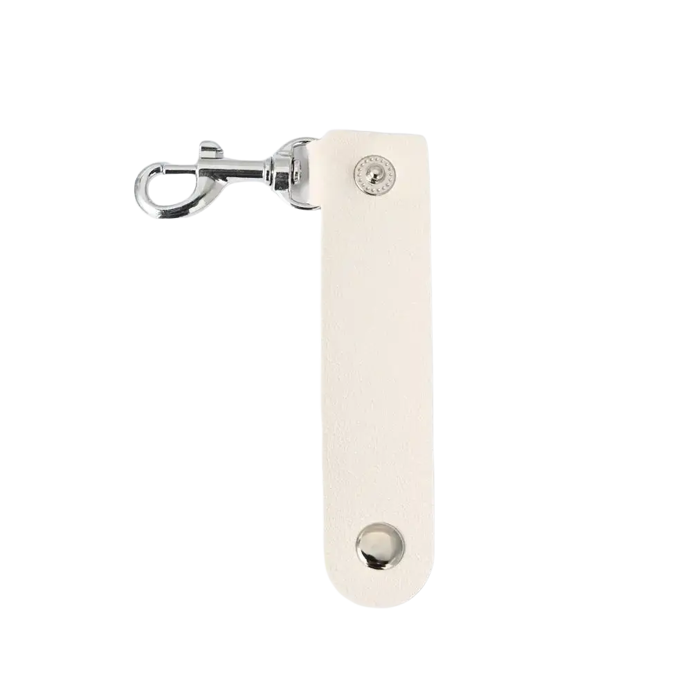 Cream-colored pu leather keychain with silver-toned metal clasp and two rivets for anti-lost car key use