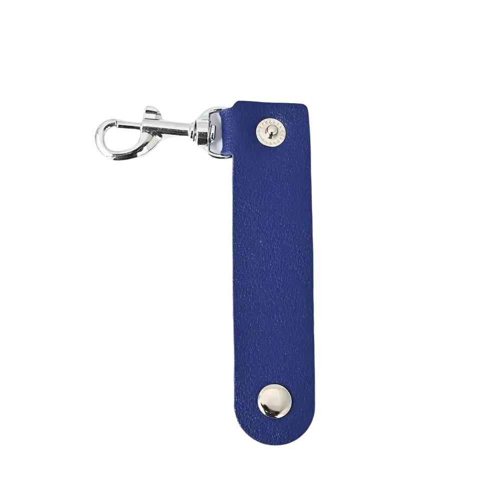 A sleek navy blue pu leather keychain with silver-toned clasp and two metallic studs for anti-lost use