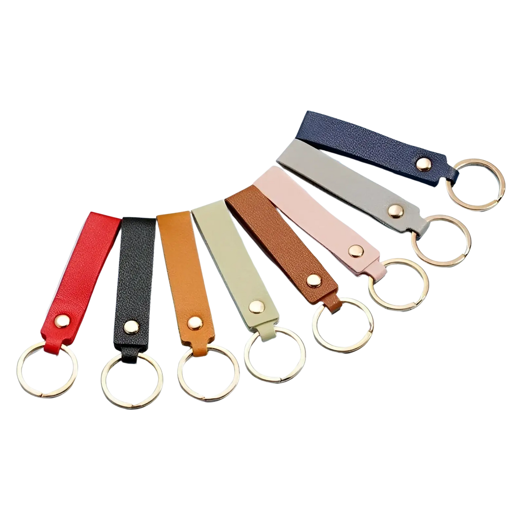 A set of colorful pu leather keychains with metal keyrings in red black orange beige brown pink gray and navy blue