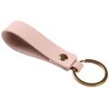 A soft pink pu leather keychain with a gold-toned metal ring and snap button for secure key organization