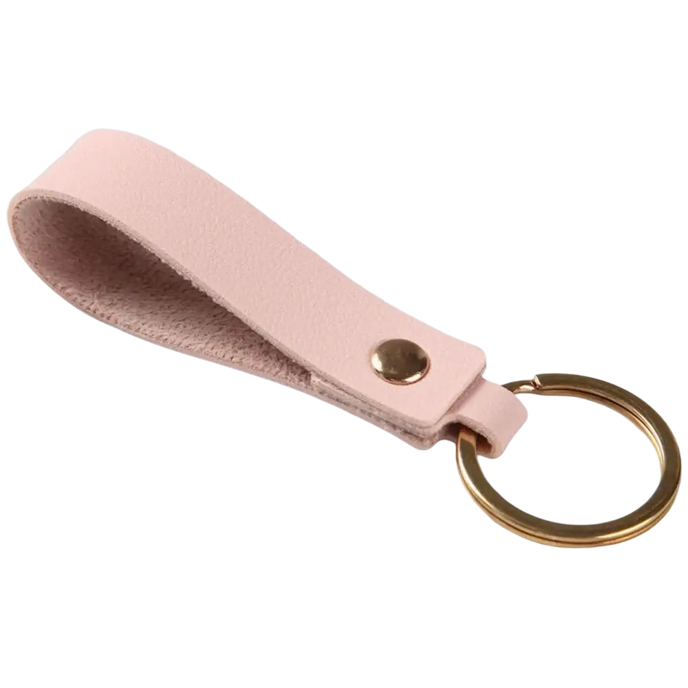 A soft pink pu leather keychain with a gold-toned metal ring and snap button for secure key organization