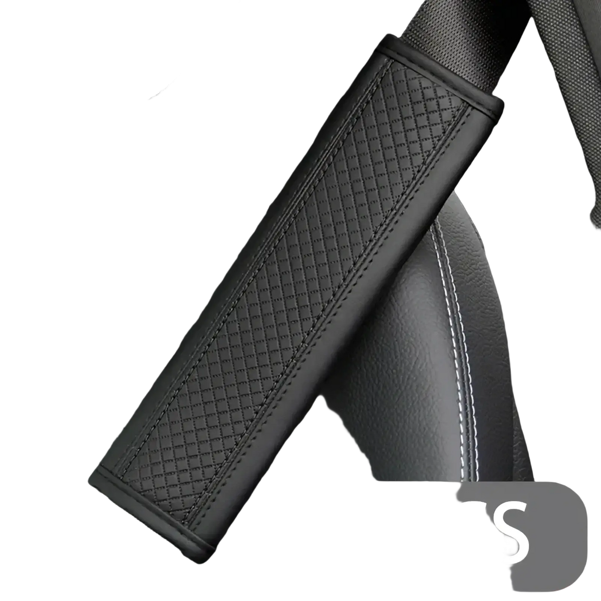 Black pu leather seat belt pad with red stitching featuring a textured diamond pattern and stitched edges