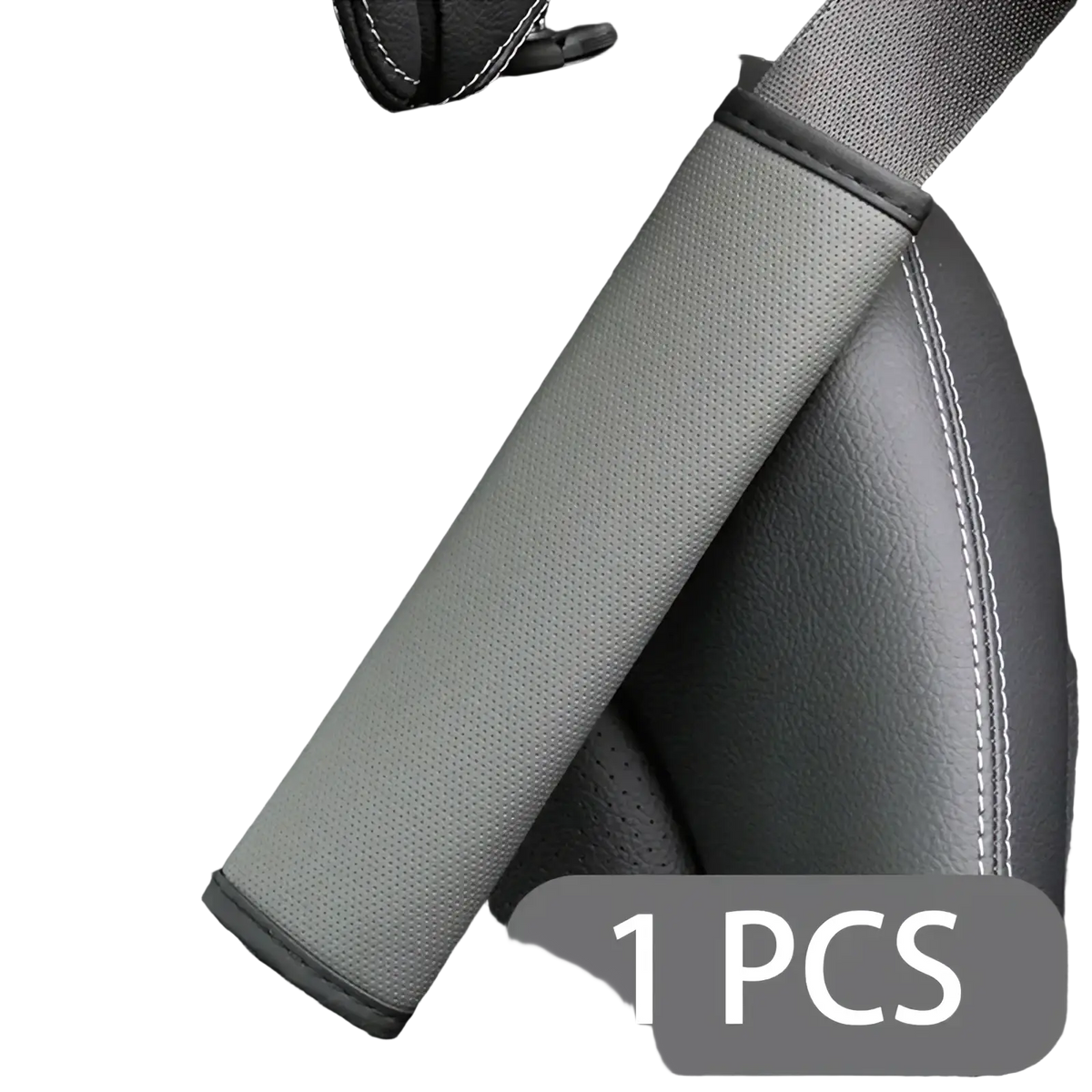 Gray textured pu leather seat belt pad with black stitched edges and red stitching for automotive use
