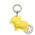 Yellow pu leather sheep keychain with stitched details and gold-tone metal ring used as a bag charm