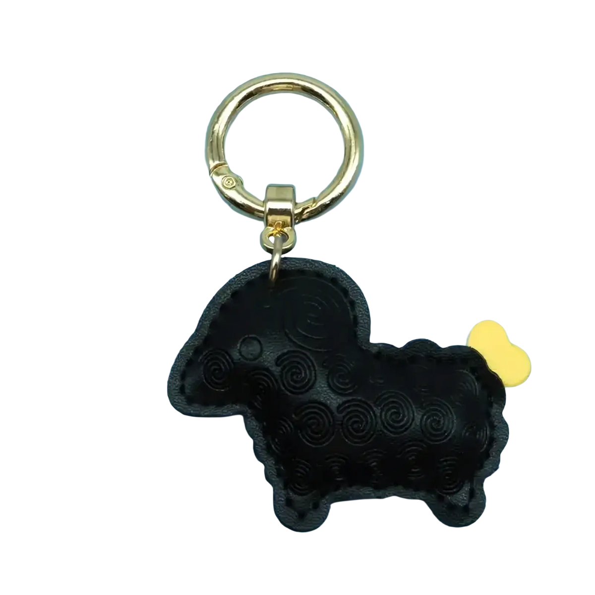 Black leather sheep keychain bag charm with gold-tone metal ring and small yellow heart-shaped accent