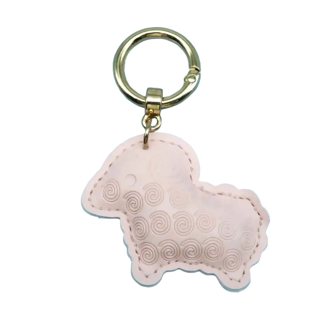 Pu leather sheep keychain bag charm in delicate pink with embossed spiral patterns and gold-toned metal ring