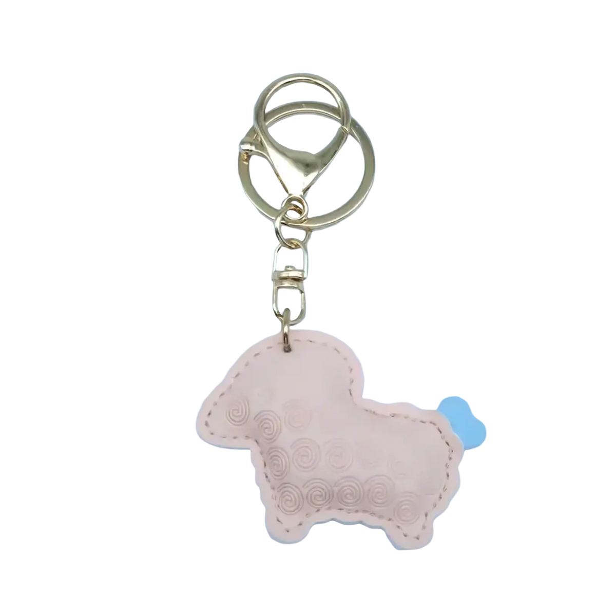 A delicate pink pu leather sheep keychain bag charm with stitched detailing and a small blue tail on gold hardware