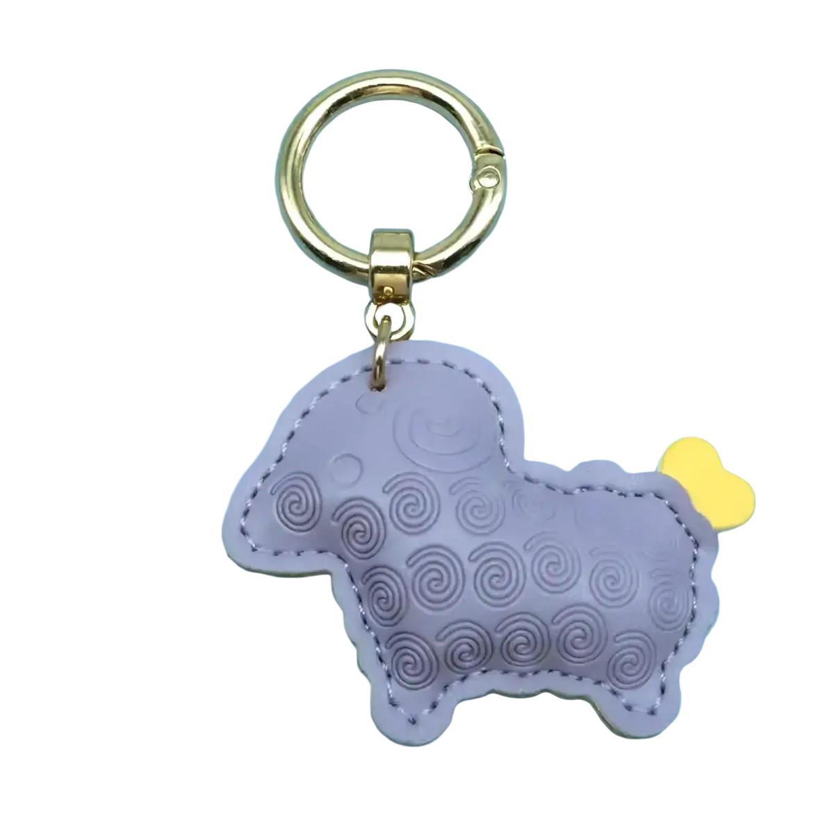 A lavender pu leather sheep keychain bag charm with a gold-tone ring and a yellow heart-shaped tail
