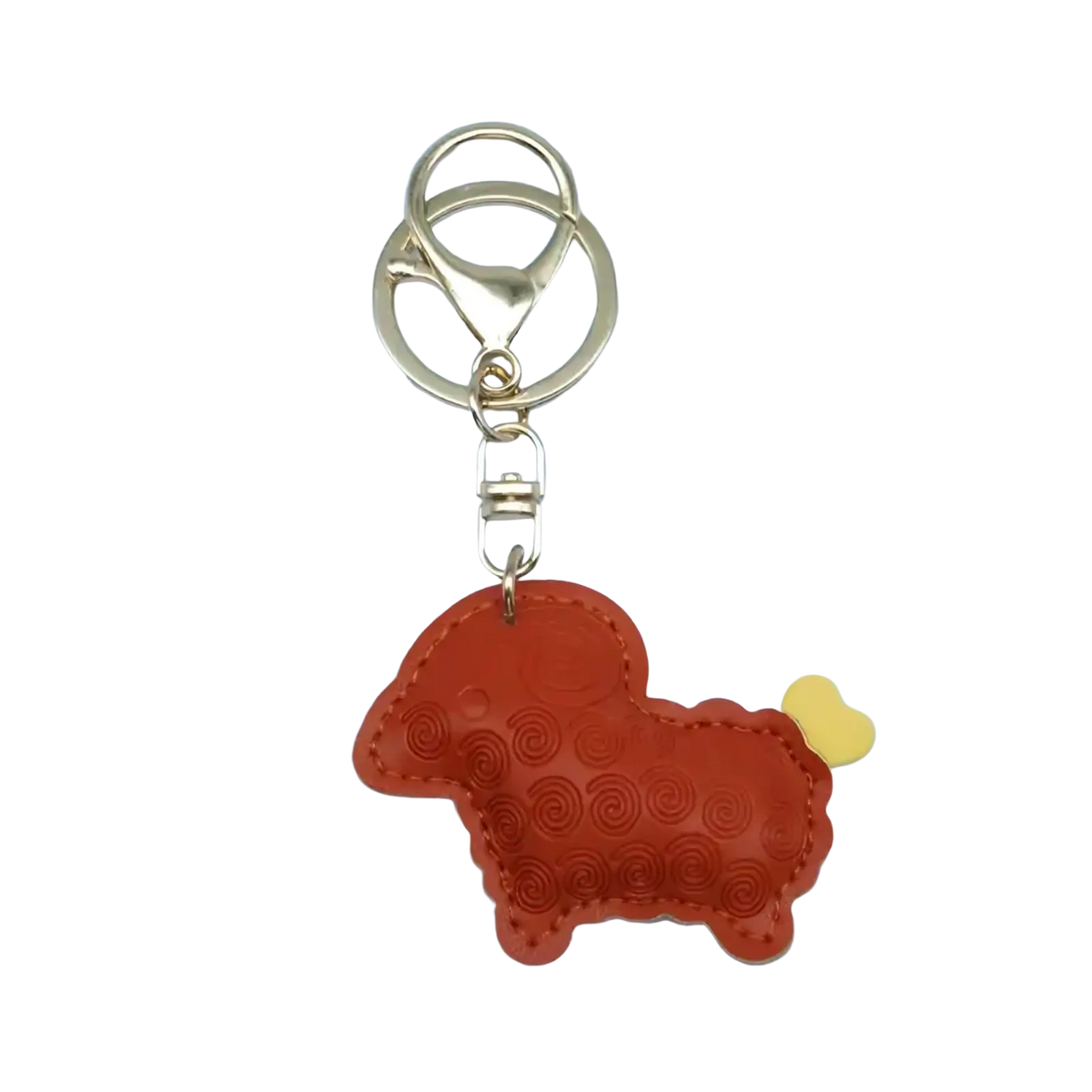 Pu leather sheep keychain bag charm in orange with embossed spiral patterns and a yellow heart-shaped tail