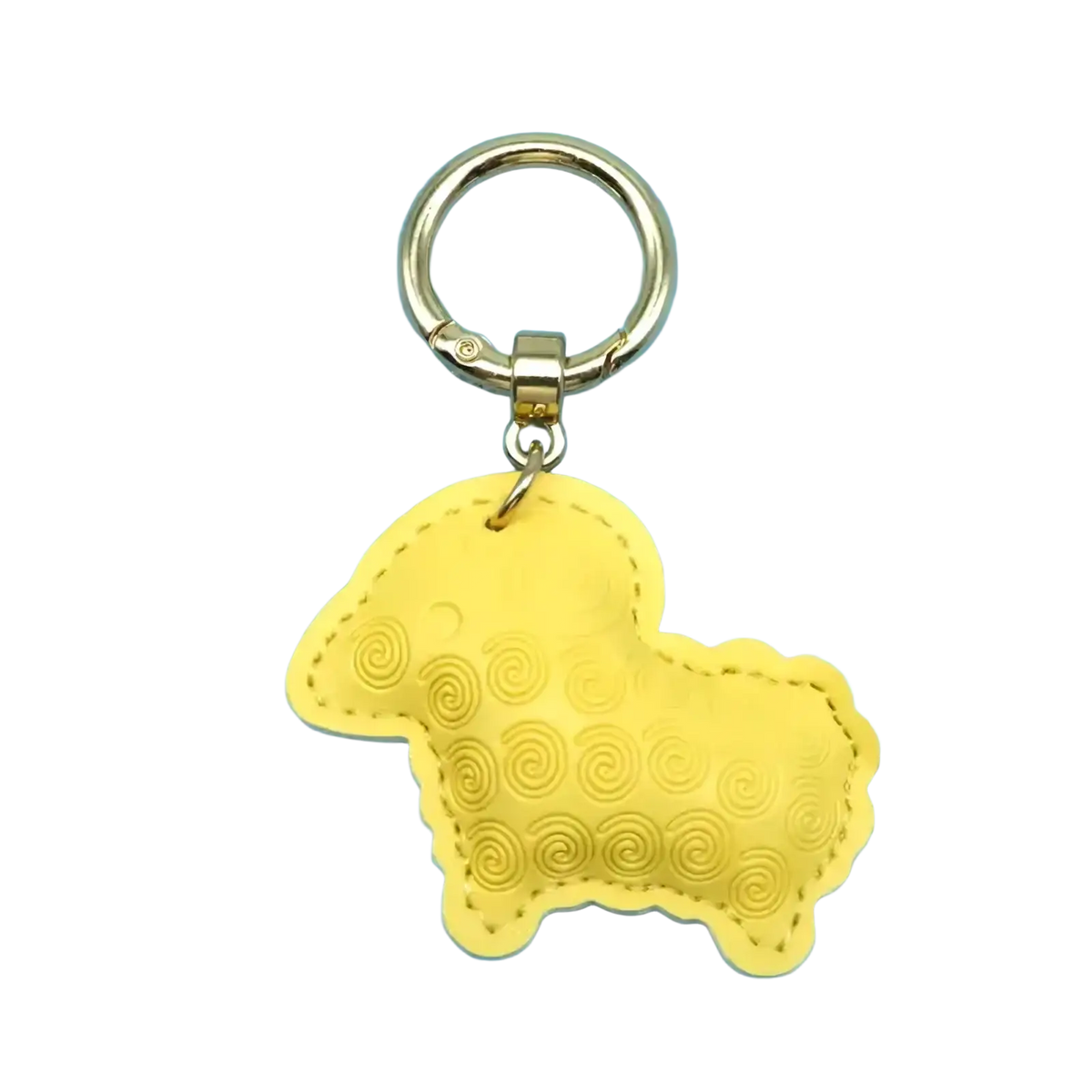 Yellow pu leather sheep keychain with stitched details and gold-tone metal ring used as a bag charm
