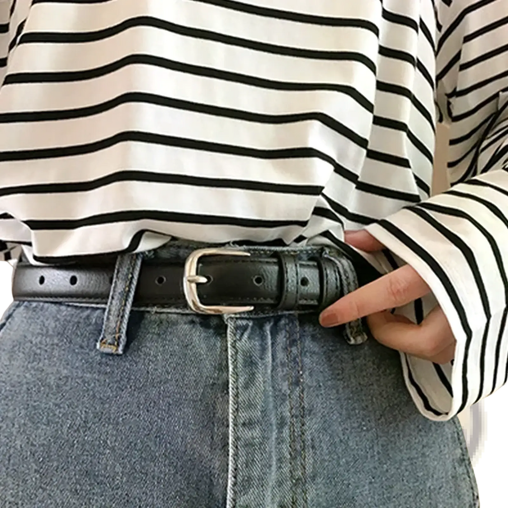 Black pu leather waist belt with metal silver-toned buckle designed for stylish and durable use