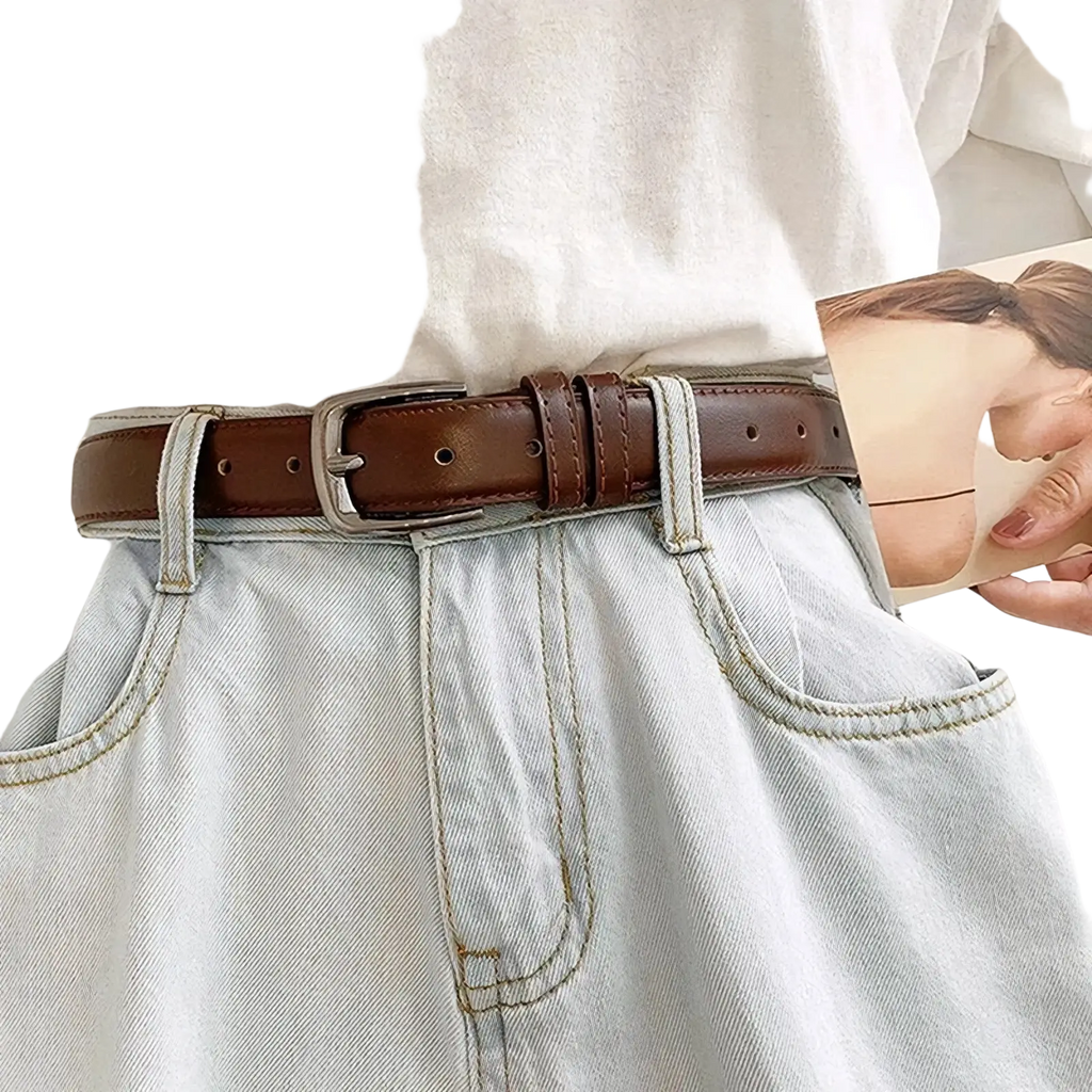 Brown pu leather women waist belt with silver metal buckle and neat stitching featuring evenly spaced holes