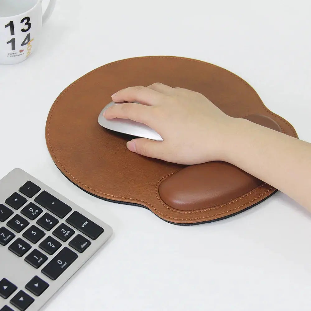 Brown ergonomic pu leather mouse pad with built-in wrist support for comfortable computer use