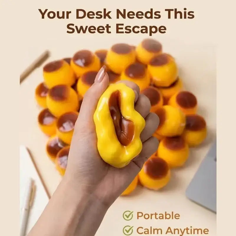Pudding squishy asmr stress relief toy in yellow and brown with caramel-filled glossy squishy texture