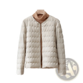 Off-white quilted puffer jacket with ruffled crew neck button closure ideal for cold weather layering