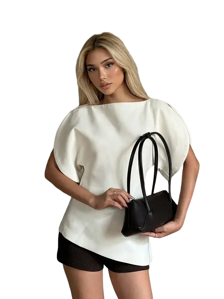 Black structured mini handbag with slender handles paired with white puff sleeve casual loose summer blouse