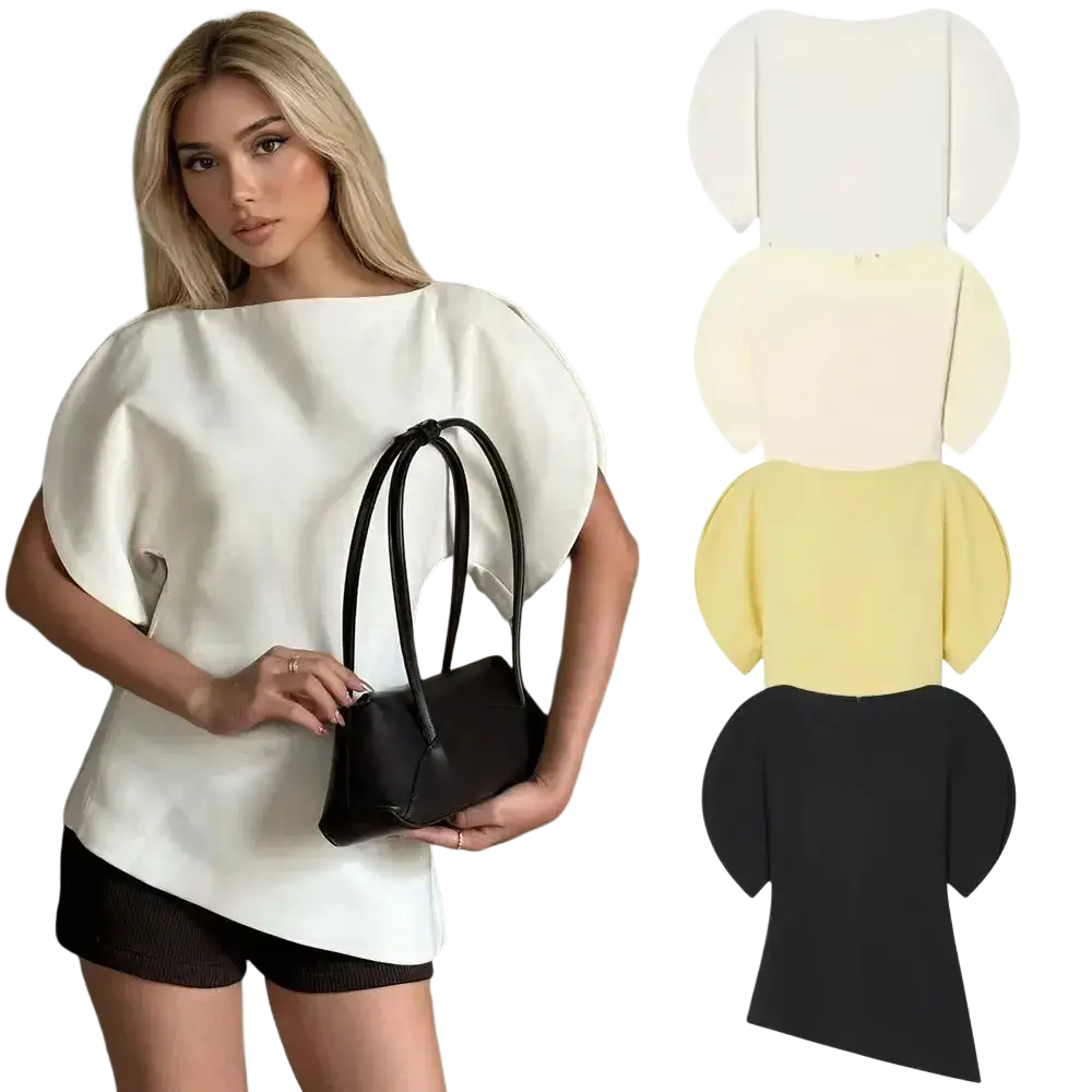 White casual loose summer blouse with puff sleeve style and voluminous sleeves in relaxed fit design