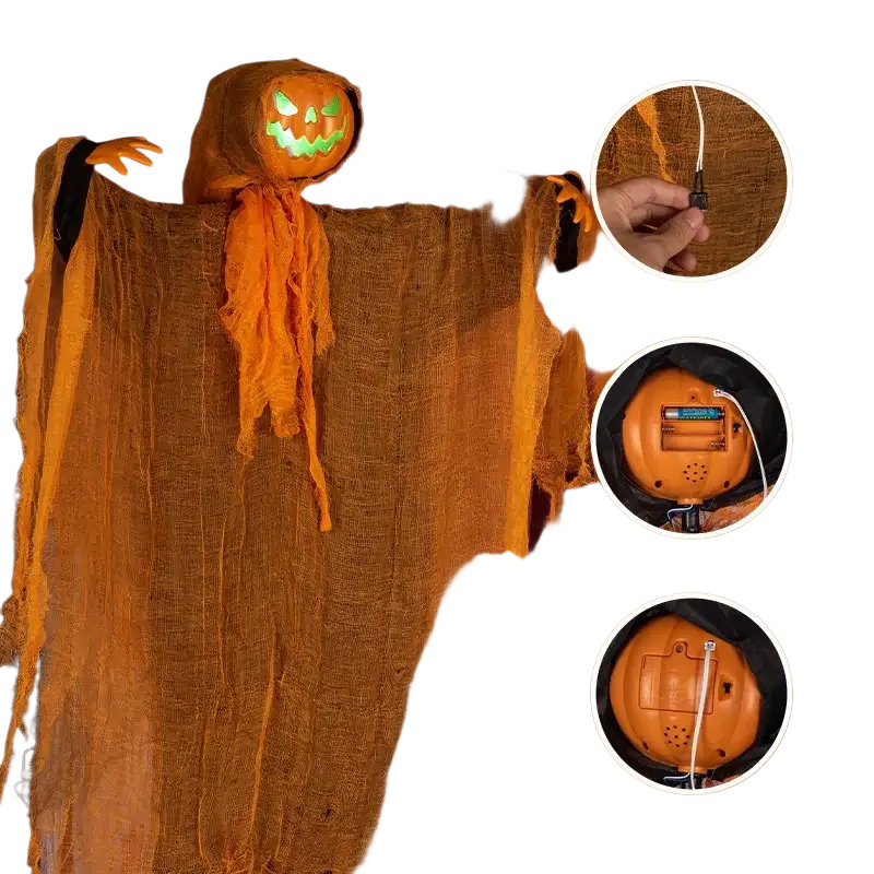 Orange pumpkin scarecrow led hanging halloween decoration with glowing green eyes and tattered textured fabric body