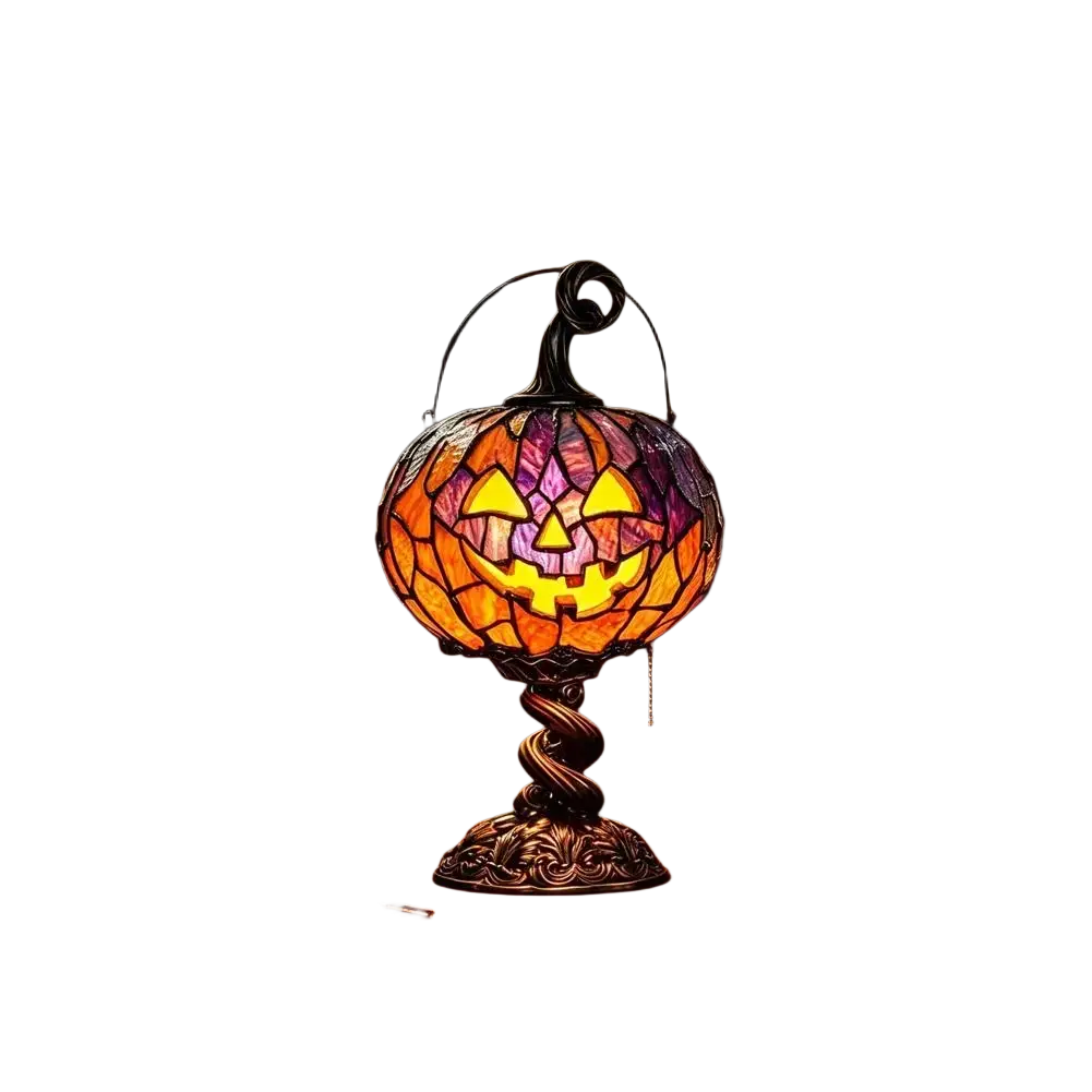 A glowing orange and purple stained glass pumpkin table lamp with black wrought iron base for halloween decor