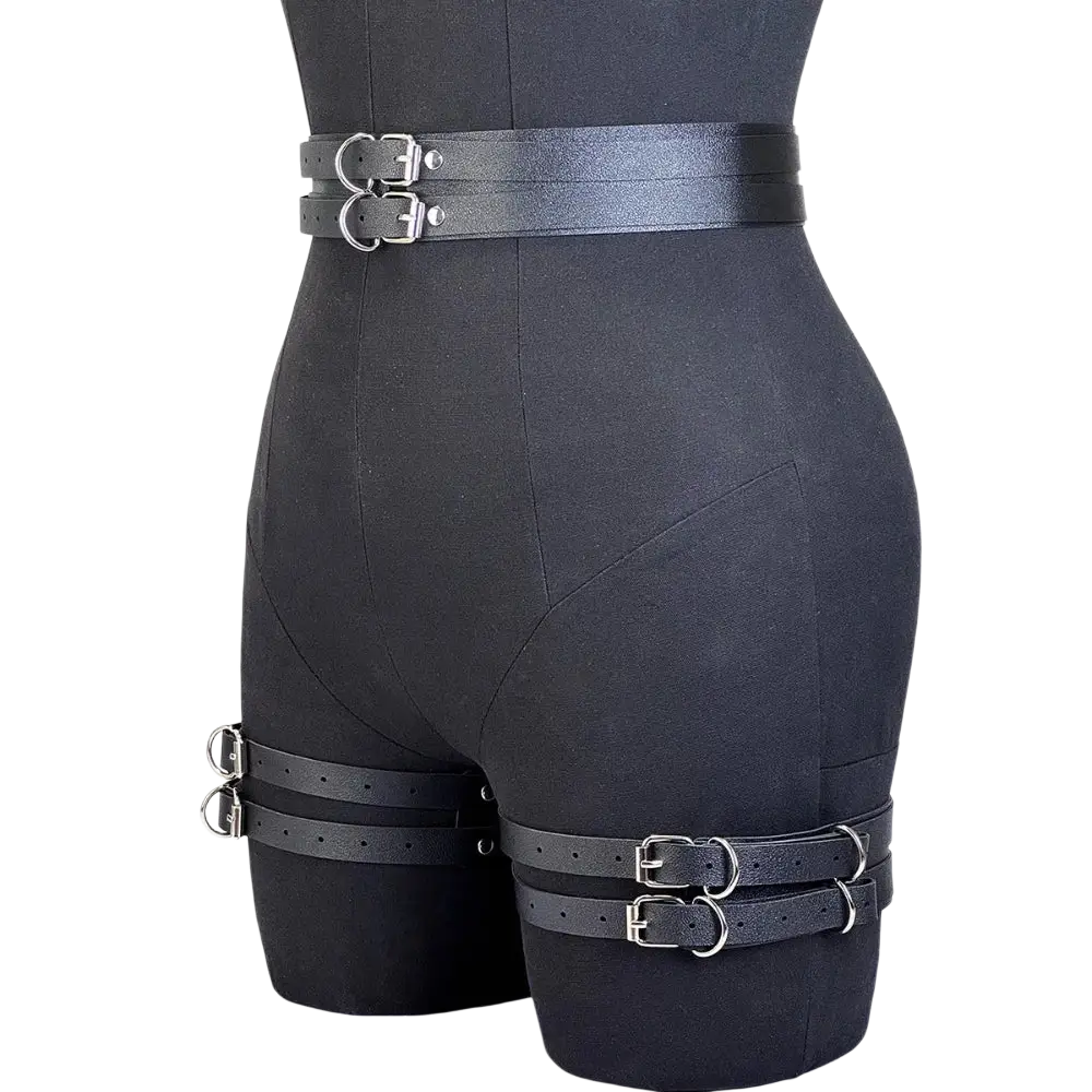 Black leather punk gothic garter belt with silver toned metal buckles and adjustable straps for edgy style