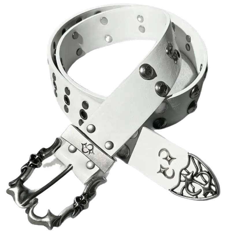 A white leather punk rock y2k retro bohemian belt with black studs and an ornate silver gothic buckle