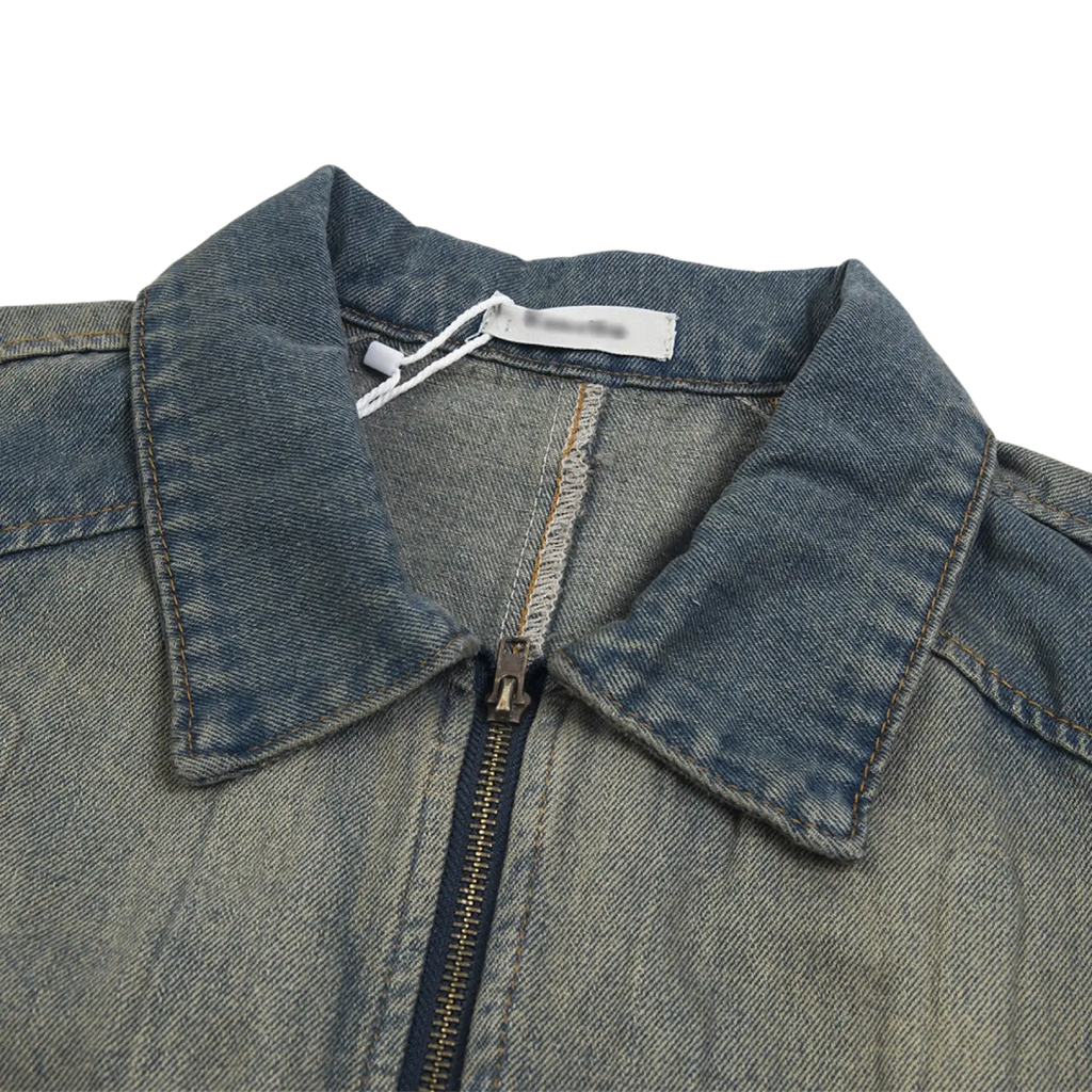 A medium-wash punk wash denim jacket for men with a classic collar and front zipper closure