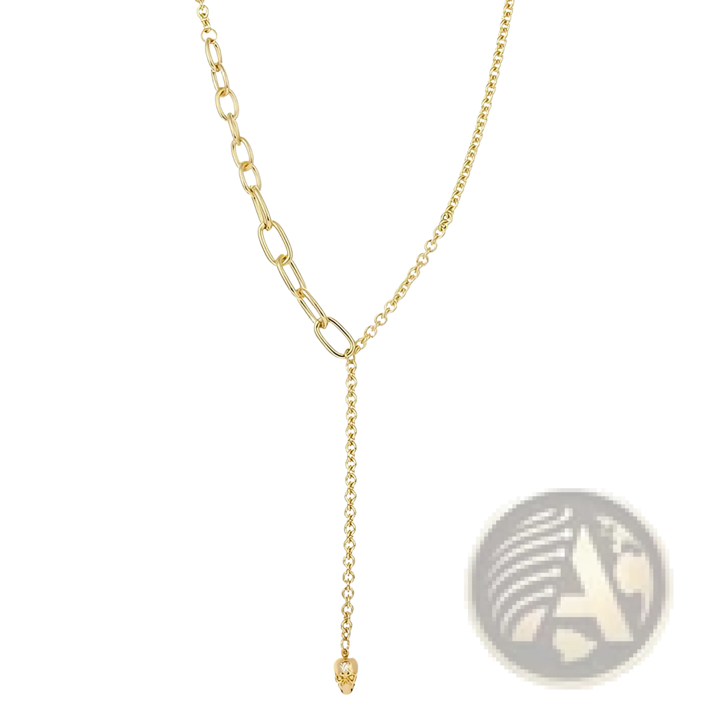 Gold-toned y-shaped chain necklace with zirconium skull pendant and pearl accents in punk style set