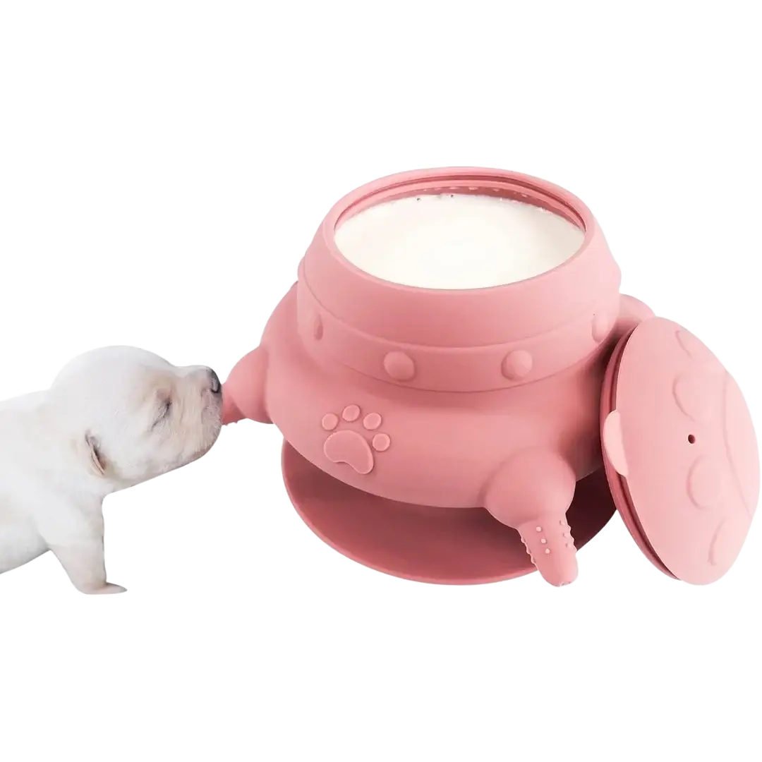 Pink silicone puppy milk feeder bowl with four nipples paw print design and suction base for easy use