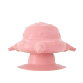 Pink silicone puppy milk feeder shaped like a rounded spaceship with wing-like appendages and a central nozzle