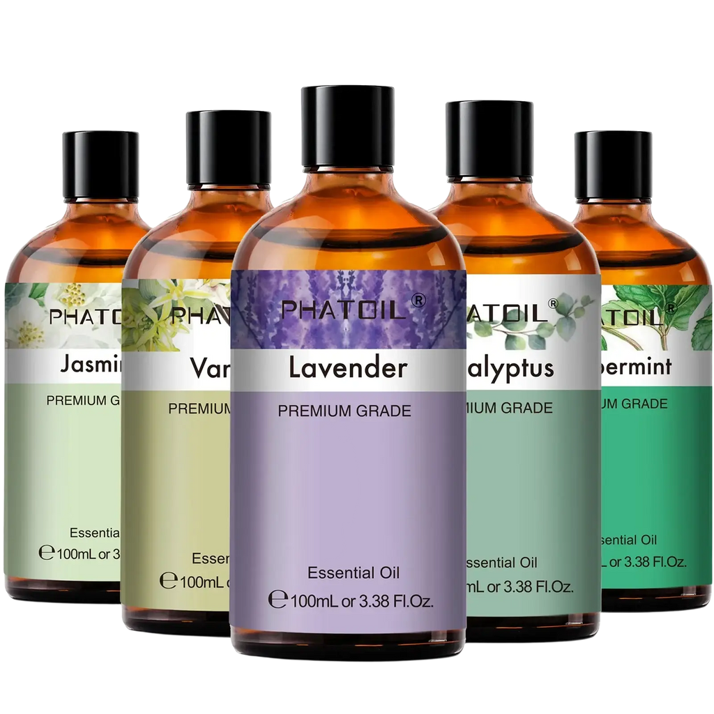 Set of five amber glass bottles of pure essential oil with black caps labeled phatoil for aromatherapy fragrance use