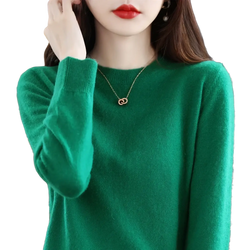 A soft vibrant green pure wool cashmere o-neck pullover sweater with long sleeves and ribbed cuffs