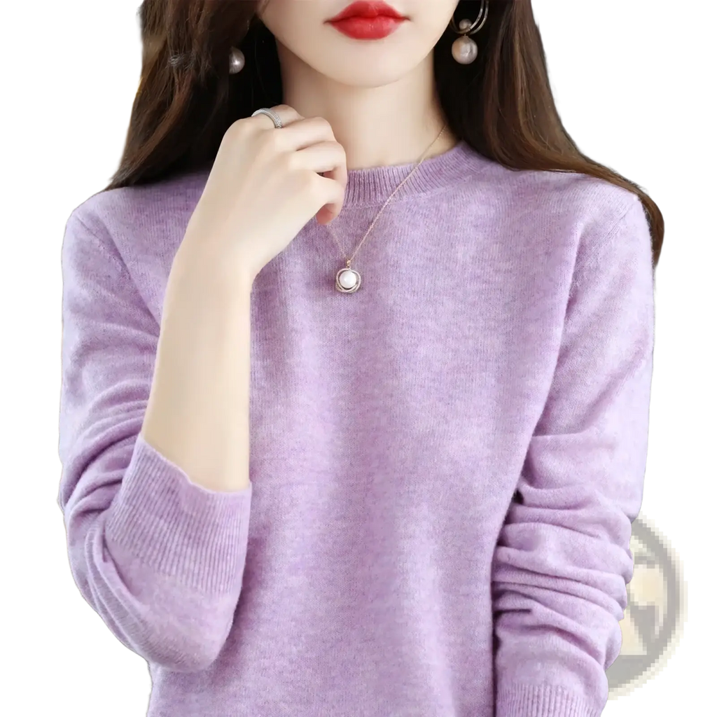 A soft lavender pure wool cashmere o-neck sweater for women with ribbed cuffs and a round neckline