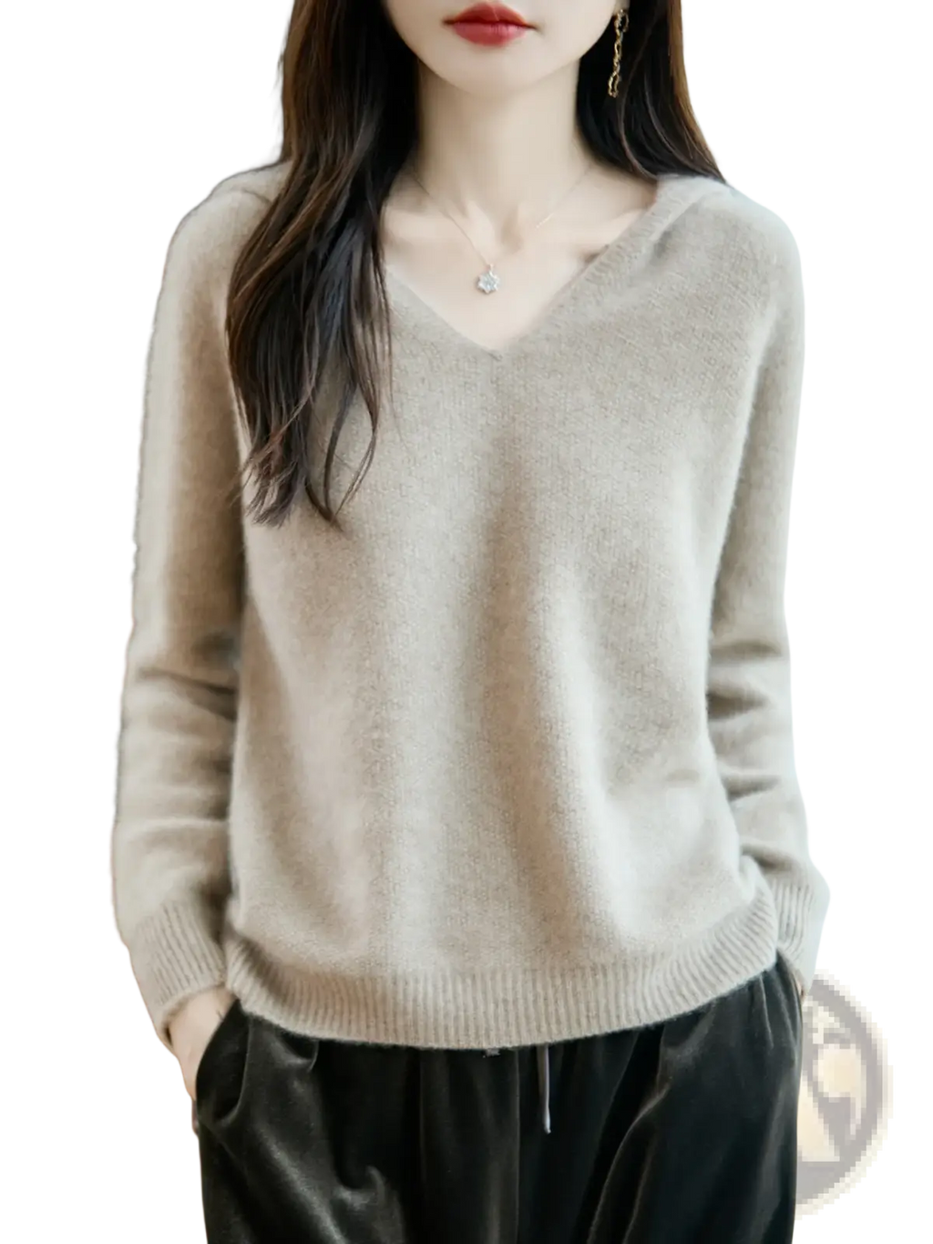 A soft light beige pure wool hooded pullover sweater with cozy knit texture and ribbed cuffs