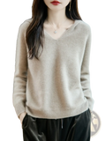 A soft light beige pure wool hooded pullover sweater with cozy knit texture and ribbed cuffs