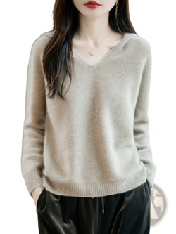 A soft light beige pure wool hooded pullover sweater with cozy knit texture and ribbed cuffs