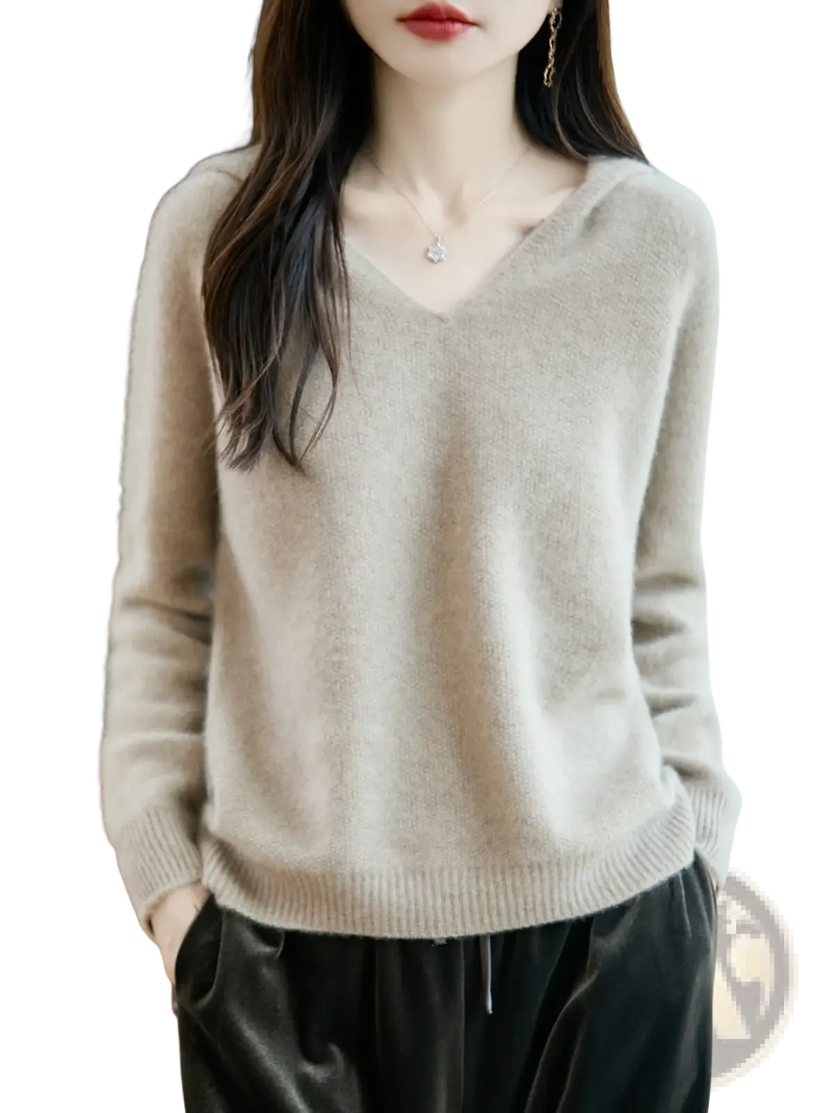 A soft light beige pure wool hooded pullover sweater with cozy knit texture and ribbed cuffs